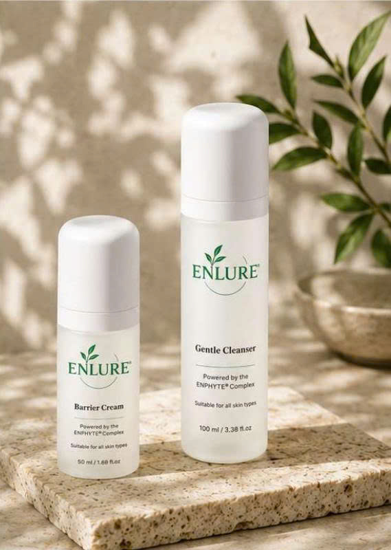 ENLURE Barrier Cream and Gentle Cleanser bottles with botanical stems